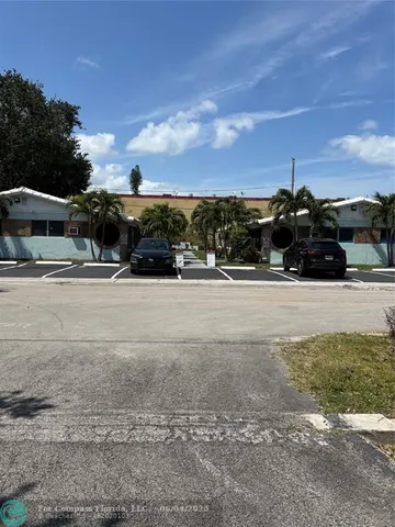 a view of street with houses