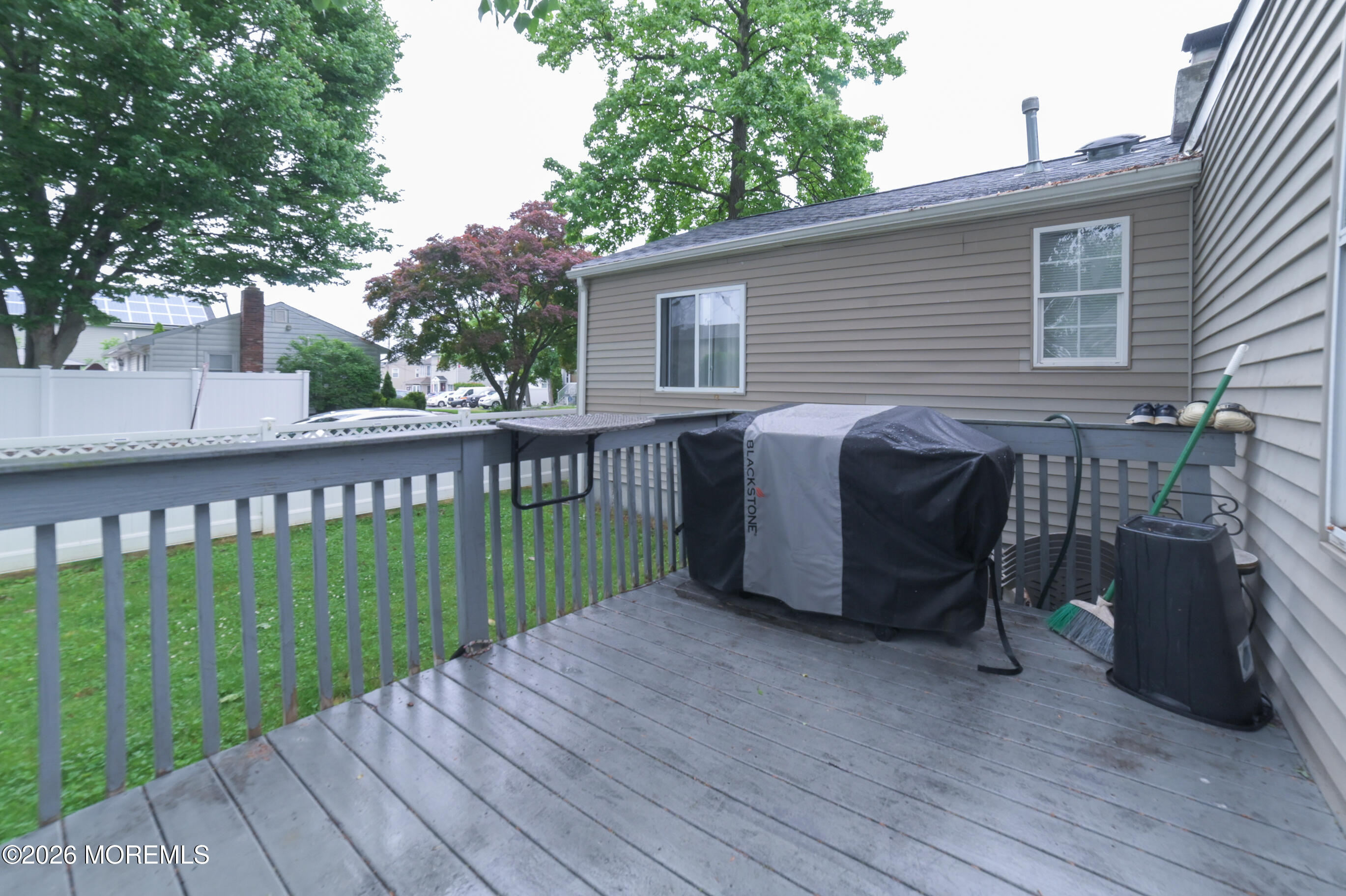 501 Gulden Street Keyport, NJ 07735 - Photo 12 of 14 a view of a deck and a yard with wooden fence