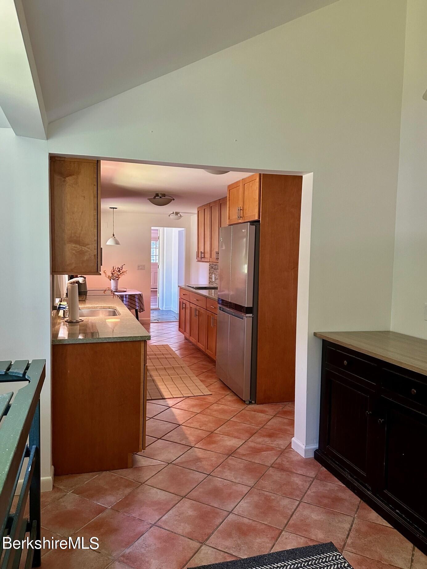 5 Cherry Hill Road Stockbridge, MA 01262 - Photo 11 of 39 a view of a kitchen with furniture and an empty room