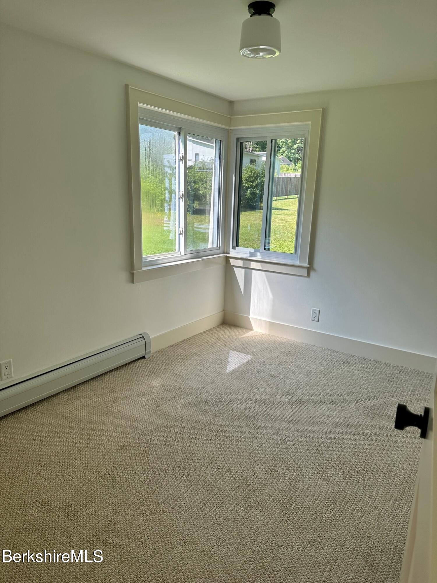 5 Cherry Hill Road Stockbridge, MA 01262 - Photo 16 of 39 an empty room with windows