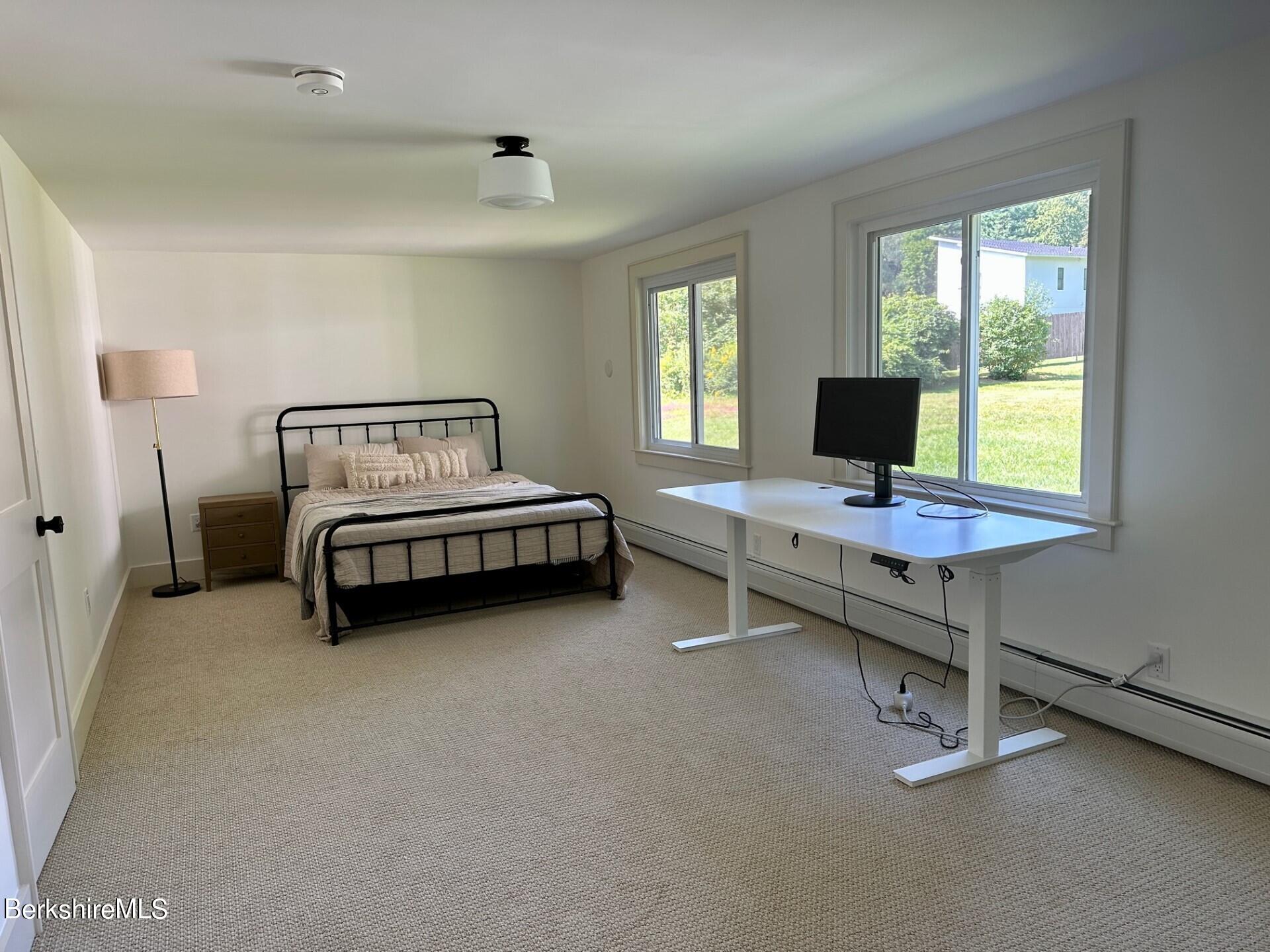 5 Cherry Hill Road Stockbridge, MA 01262 - Photo 18 of 39 a bedroom with furniture and a window