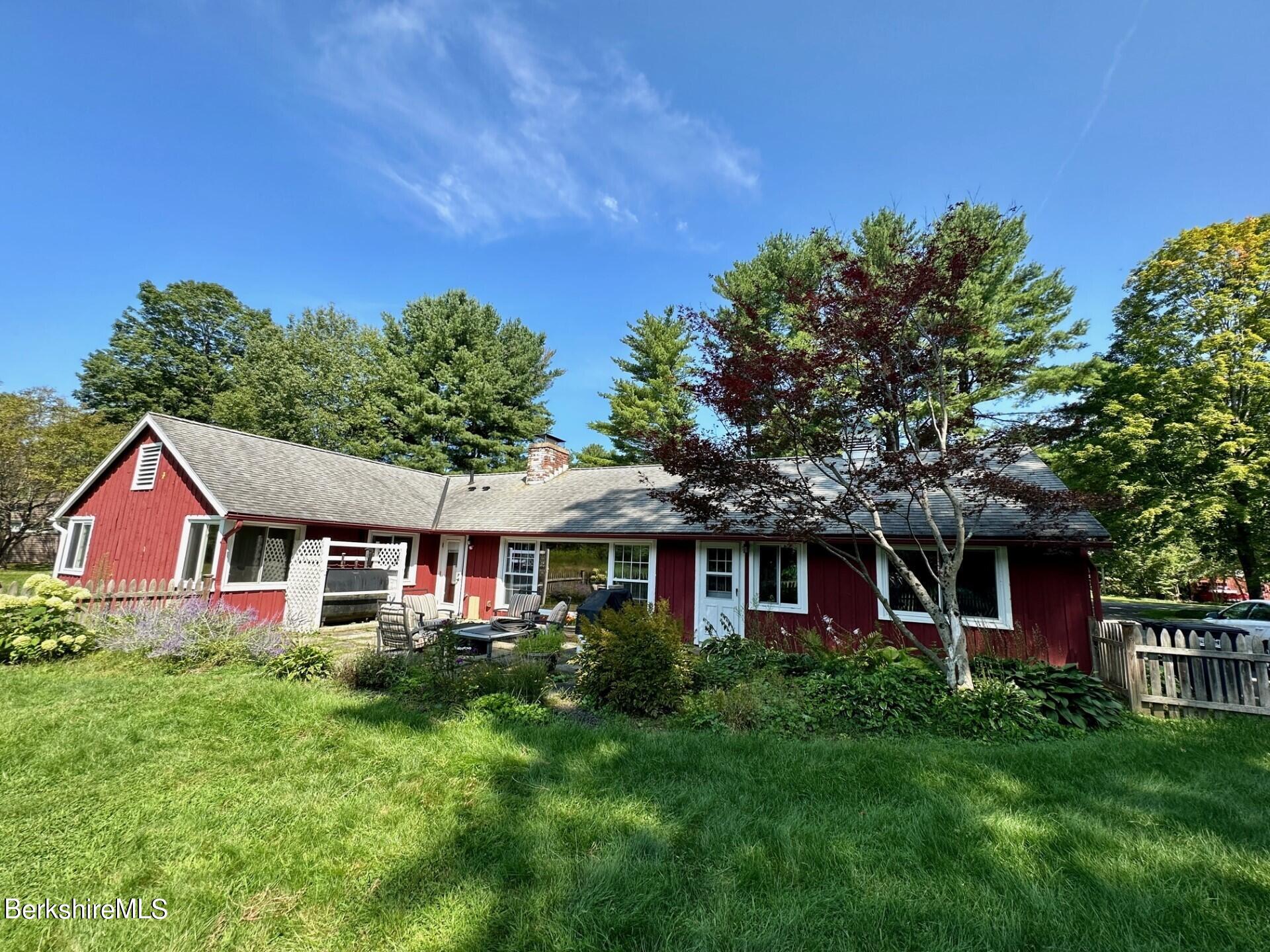 5 Cherry Hill Road Stockbridge, MA 01262 - Photo 33 of 39 a front view of a house with a yard