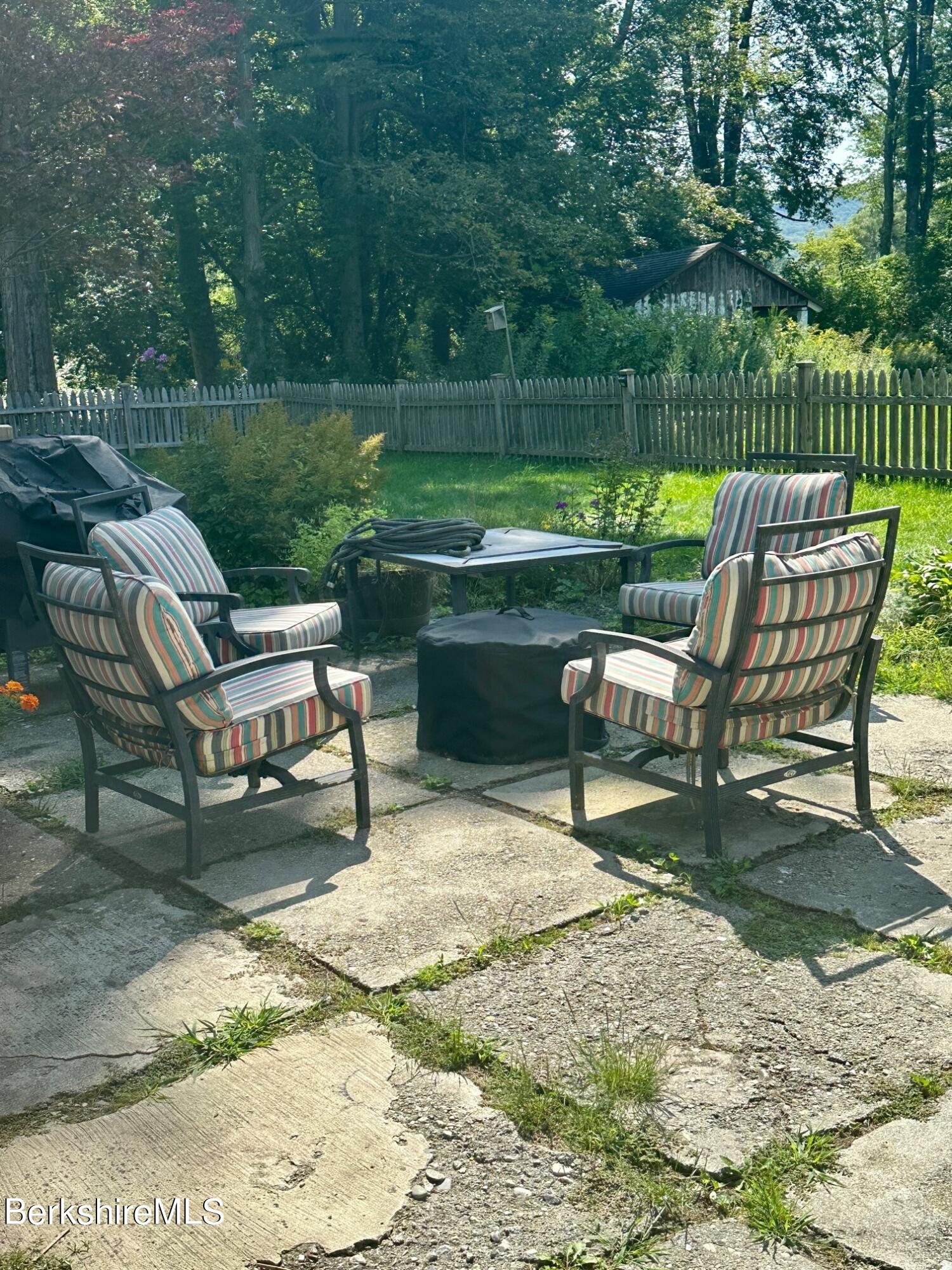 5 Cherry Hill Road Stockbridge, MA 01262 - Photo 35 of 39 a chairs and a table in a lake