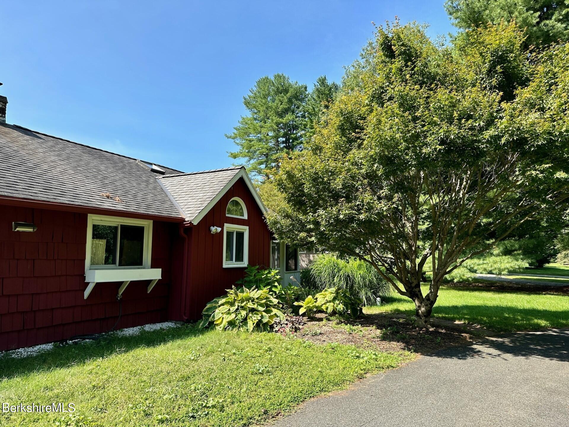 5 Cherry Hill Road Stockbridge, MA 01262 - Photo 37 of 39 a front view of a house with a yard