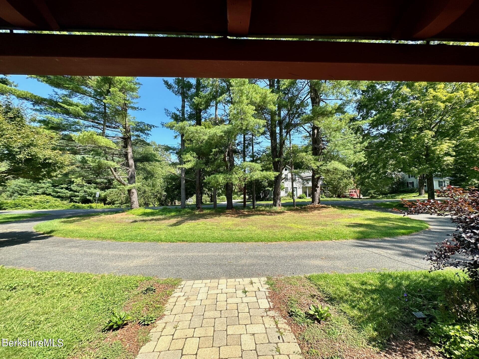 5 Cherry Hill Road Stockbridge, MA 01262 - Photo 38 of 39 a view of a yard in front of a building