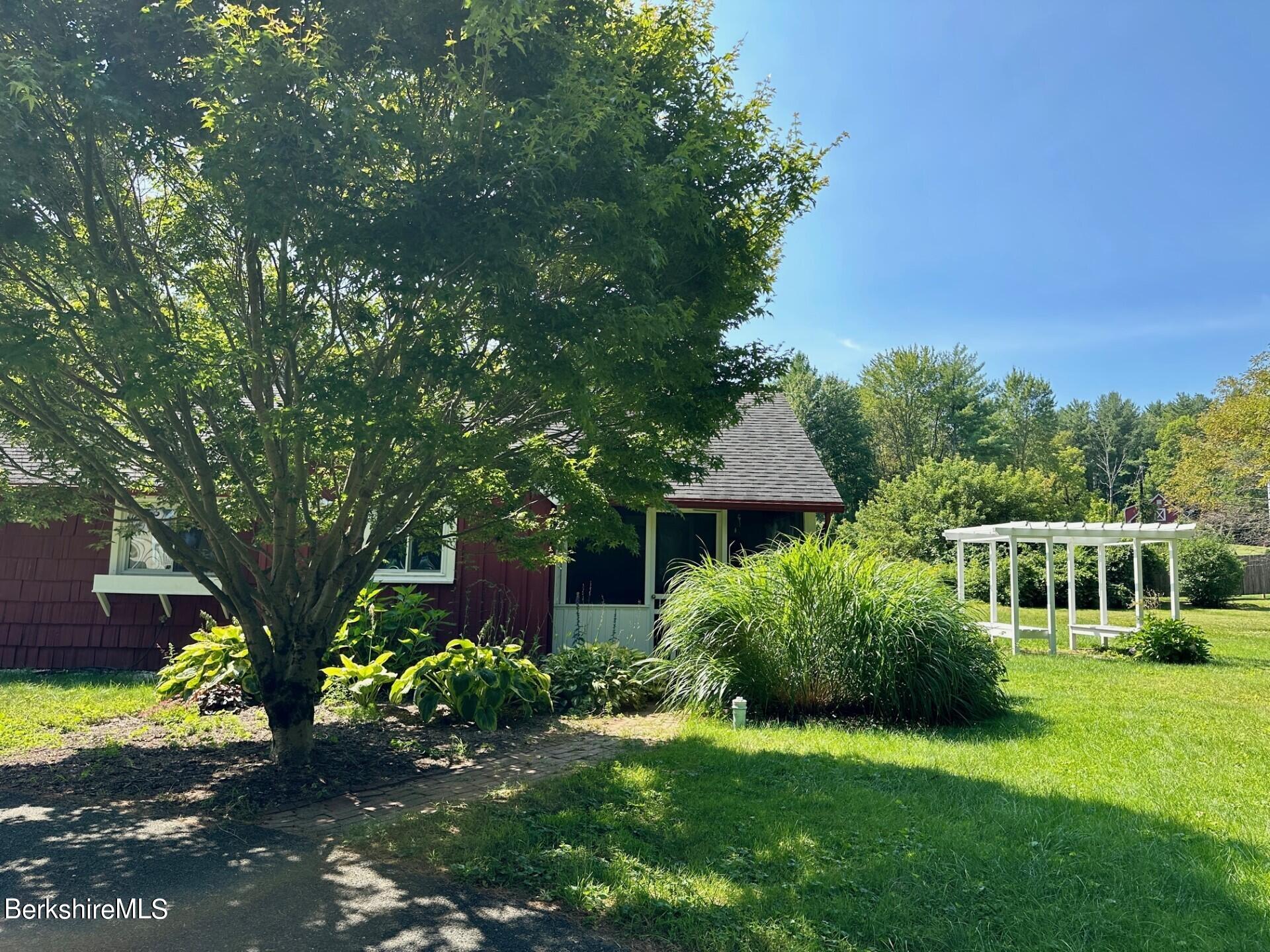 5 Cherry Hill Road Stockbridge, MA 01262 - Photo 39 of 39 a front view of a house with garden