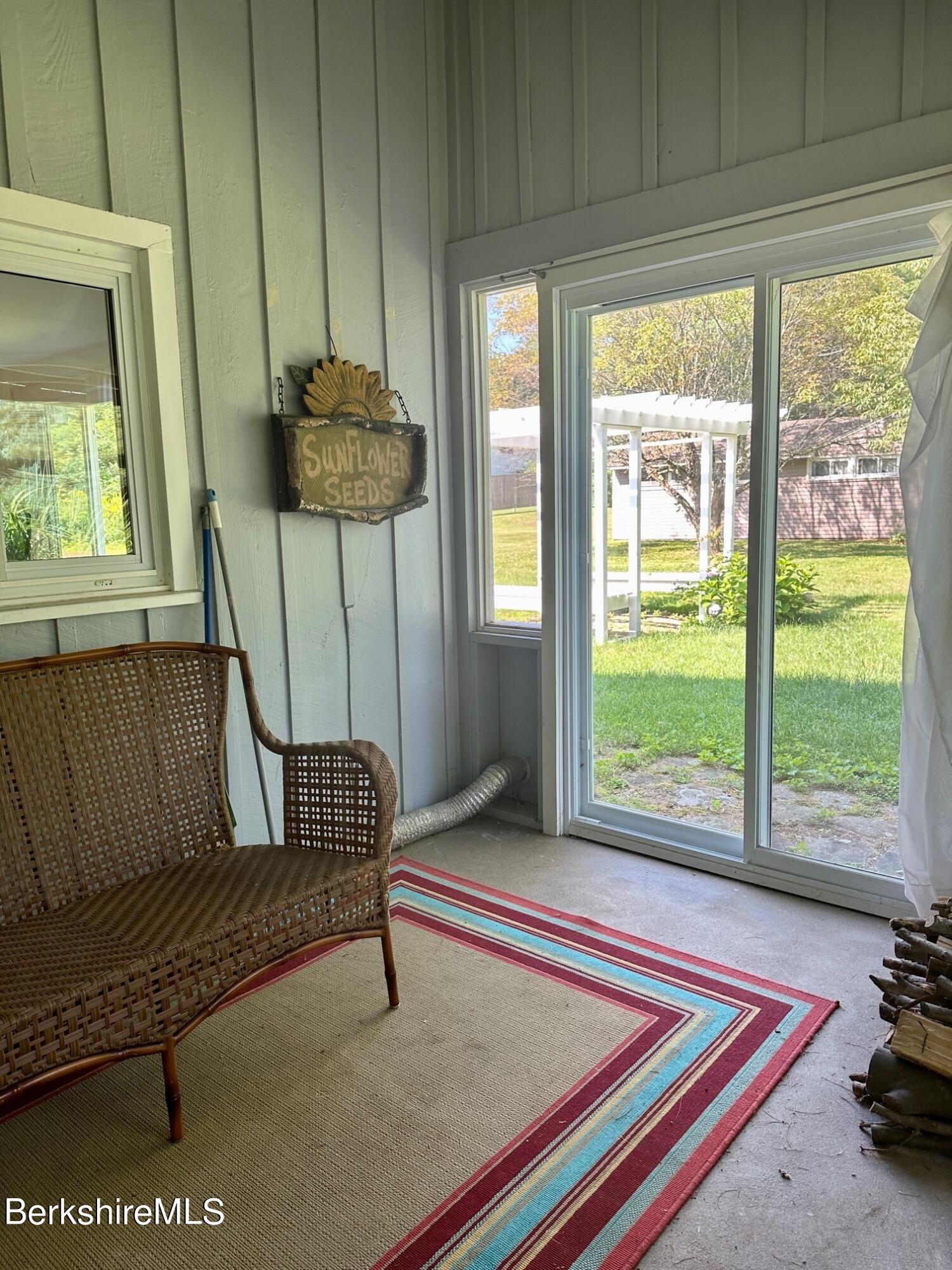 5 Cherry Hill Road Stockbridge, MA 01262 - Photo 9 of 39 a living room with furniture and a window