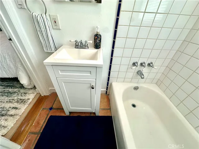 a bathroom with a sink and a tub