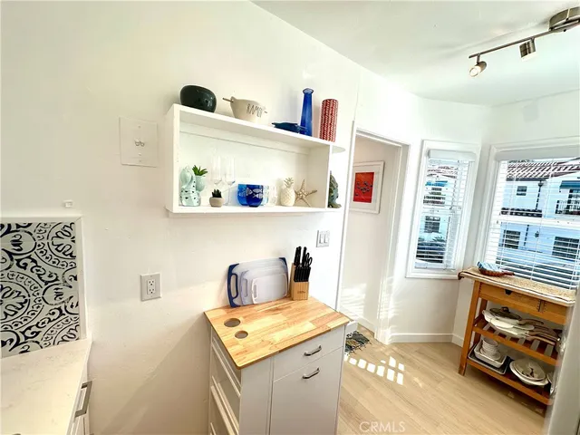 a workspace with furniture and window