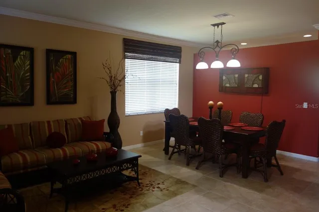 a view of a dining room with furniture