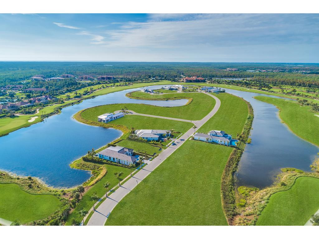 9828 Montiano Place Naples, FL 34113 - Photo 5 of 18 a view of a swimming pool and outdoor space