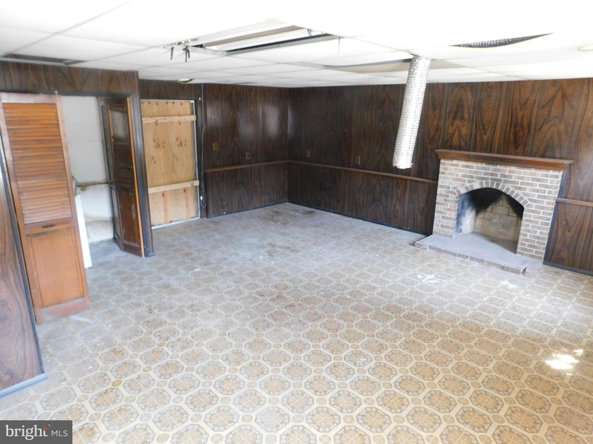 8510 Contee Road Laurel, MD 20708 - Photo 22 of 22 Basement Family room with fireplace