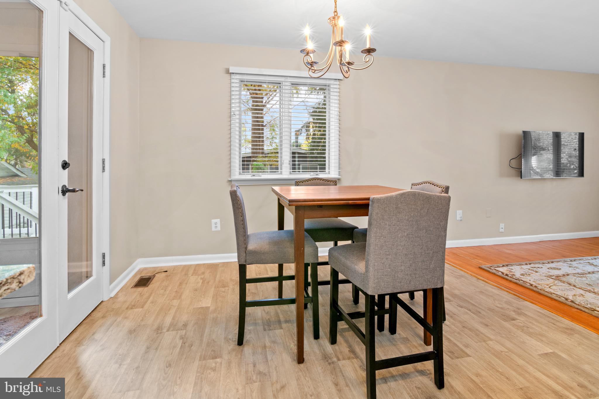 2709 Parkview Drive Riva, MD 21140 - Photo 12 of 53 a view of a dining room with furniture window and wooden floor