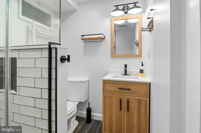 a view of a two chairs in the balcony