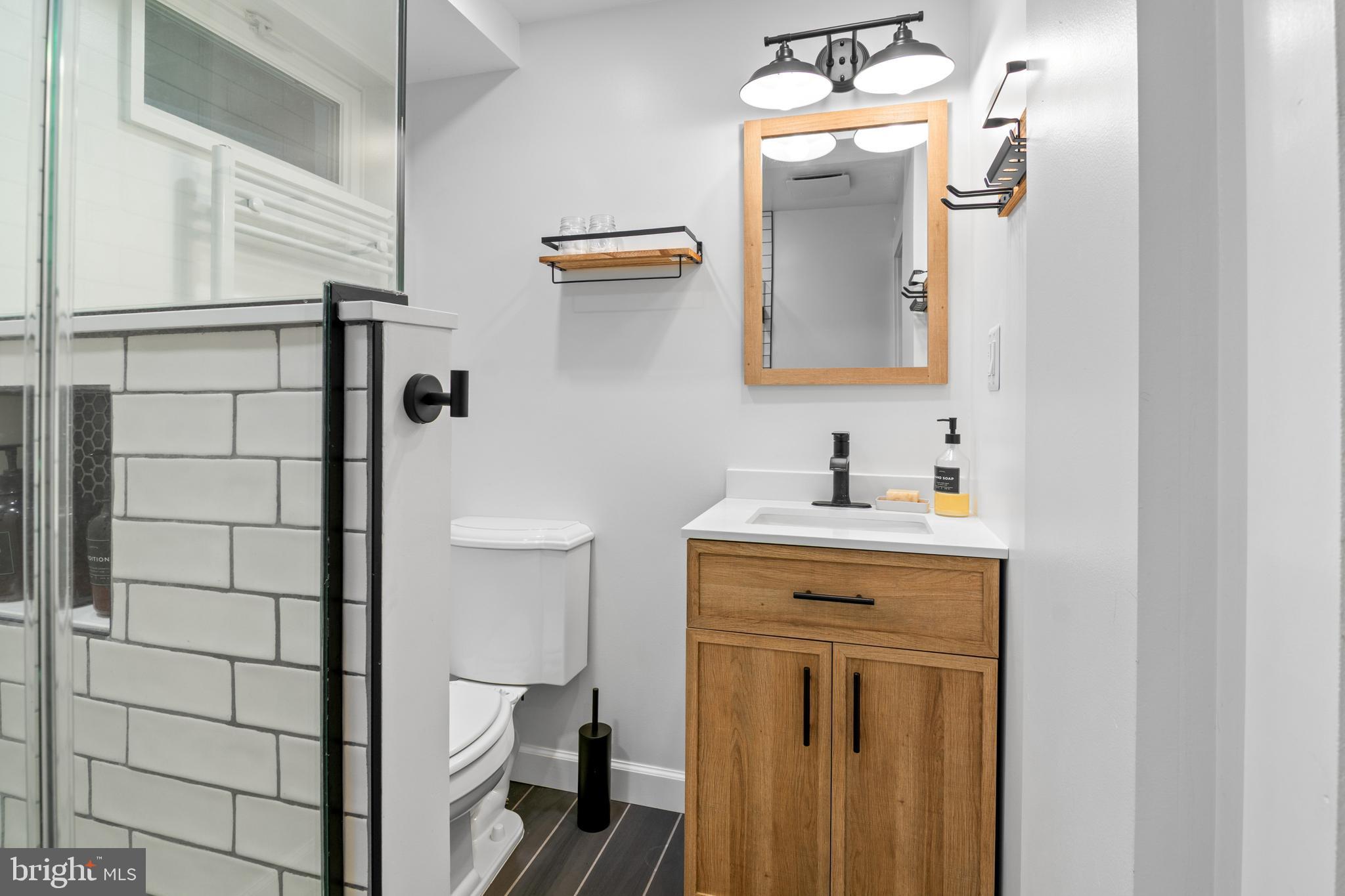 2709 Parkview Drive Riva, MD 21140 - Photo 40 of 53 a bathroom with a sink and a mirror