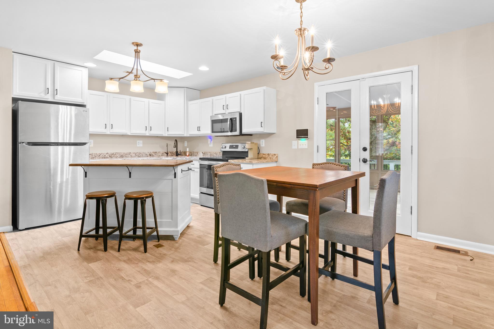 2709 Parkview Drive Riva, MD 21140 - Photo 9 of 53 a view of a dining room with furniture and a chandelier