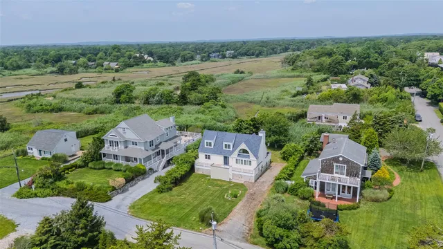 an aerial view of a house with a garden