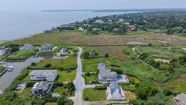 an aerial view of a house with a garden