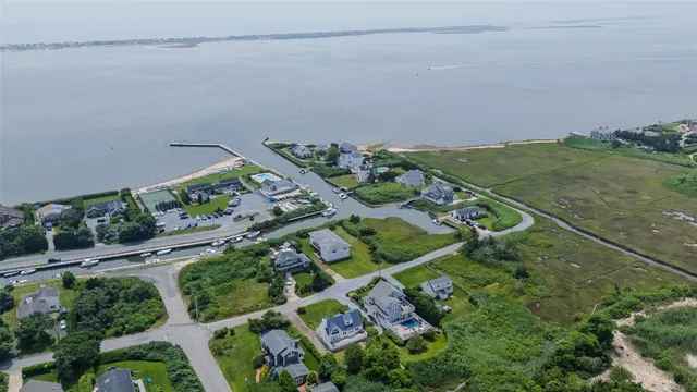 an aerial view of house with yard