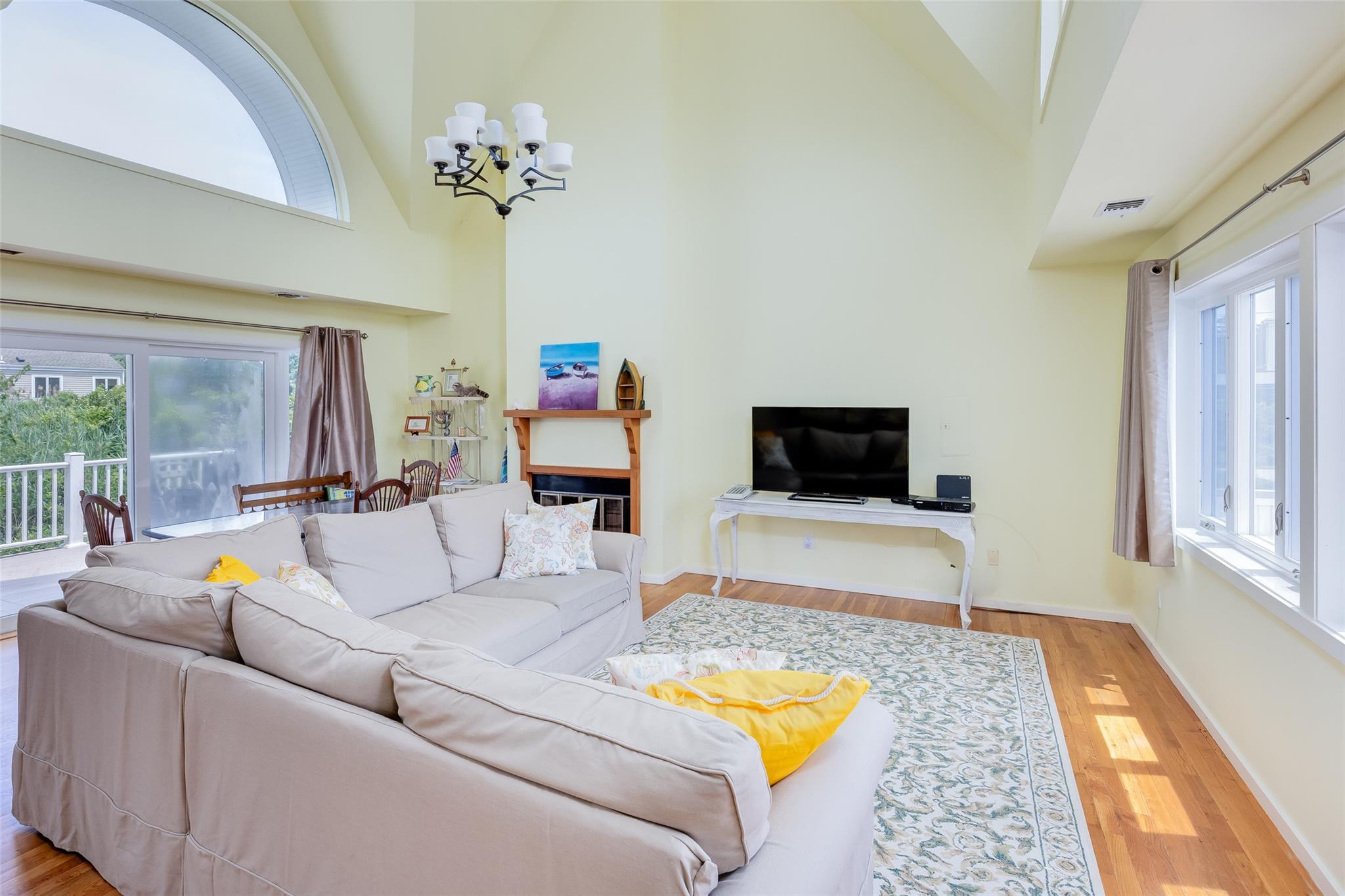 10 Bayview Road Remsenburg, NY 11960 - Photo 22 of 47 a living room with furniture and a flat screen tv