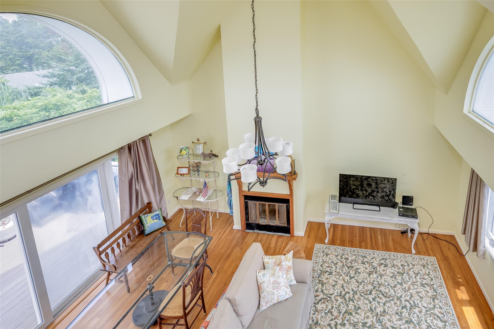 10 Bayview Road Remsenburg, NY 11960 - Photo 39 of 47 a living room with furniture and a fireplace