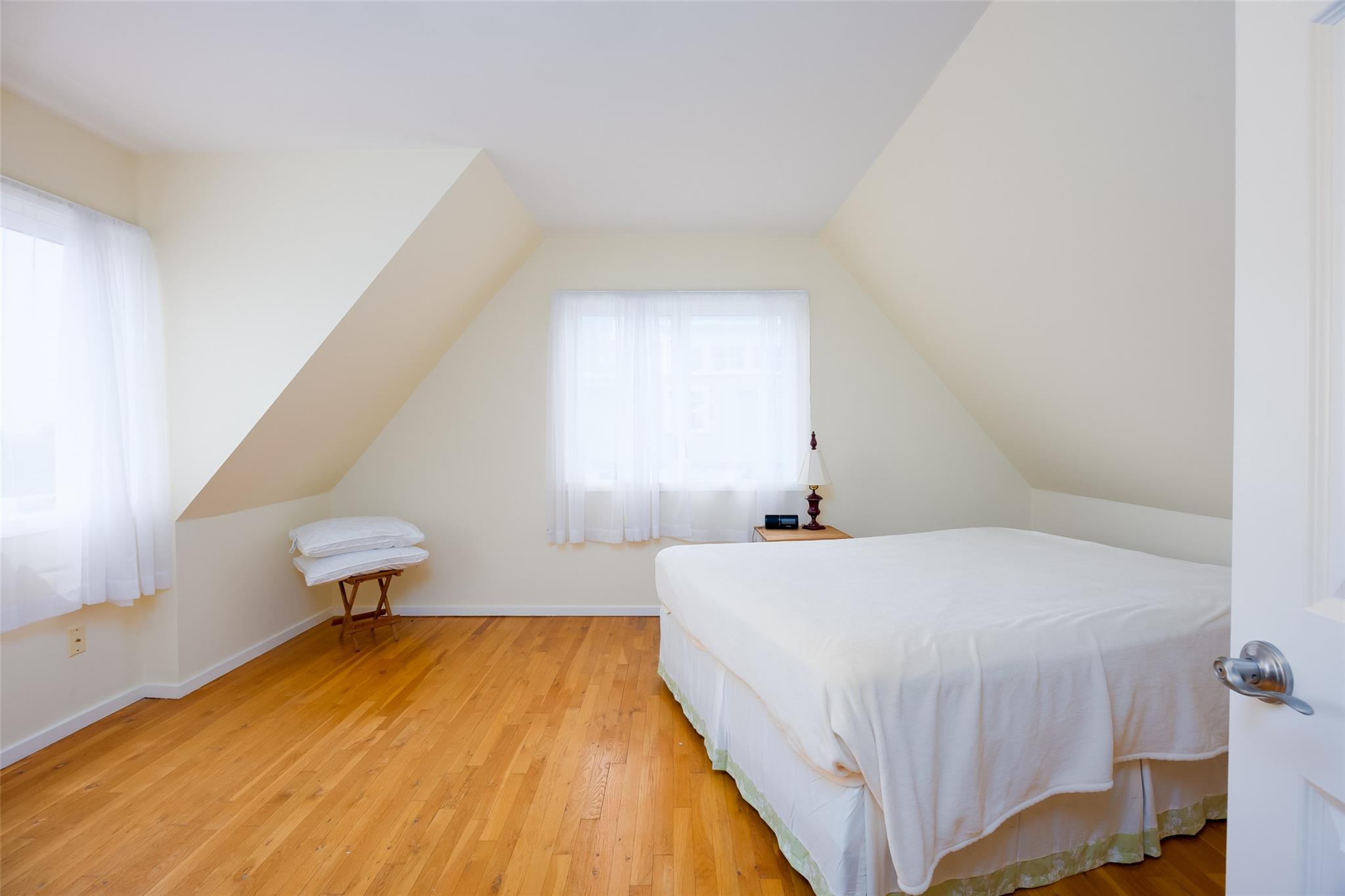 10 Bayview Road Remsenburg, NY 11960 - Photo 42 of 47 a bedroom with a bed and window