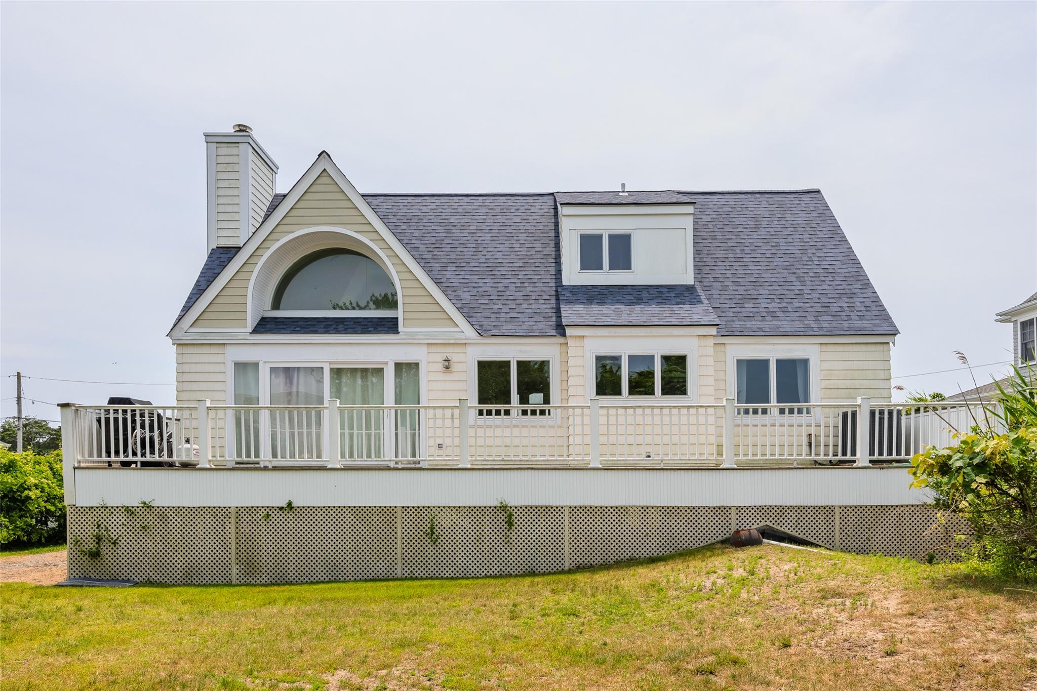 10 Bayview Road Remsenburg, NY 11960 - Photo 6 of 47 a view of a house with a swimming pool
