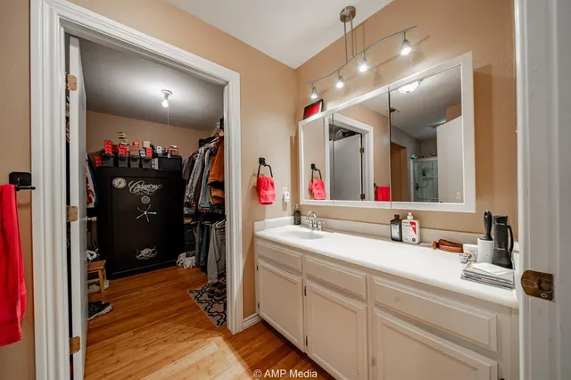 a bedroom with bed and window