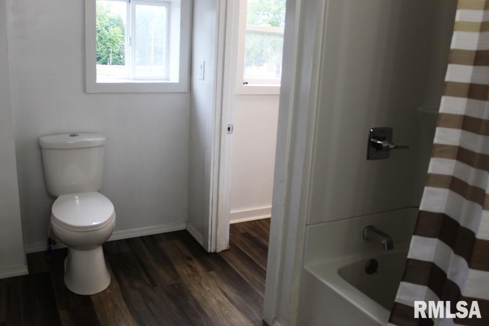 632 East 9th Street Kewanee, IL 61443 - Photo 36 of 36 a bathroom with a toilet and a shower