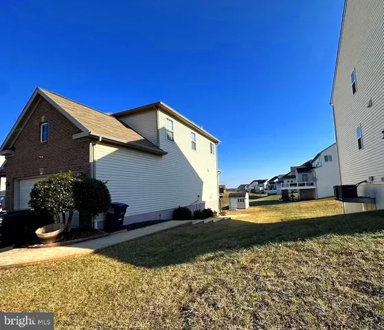 a view of a house with swimming pool
