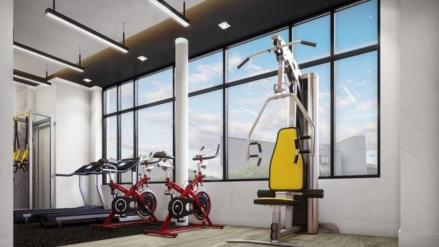 a view of a room with gym equipment