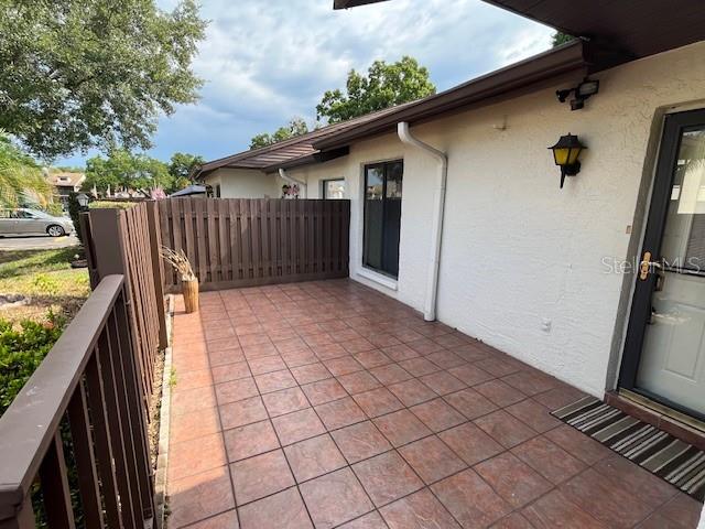 1725 Pine Ridge Way East, Unit C Palm Harbor, FL 34684 - Photo 2 of 28 a view of a backyard
