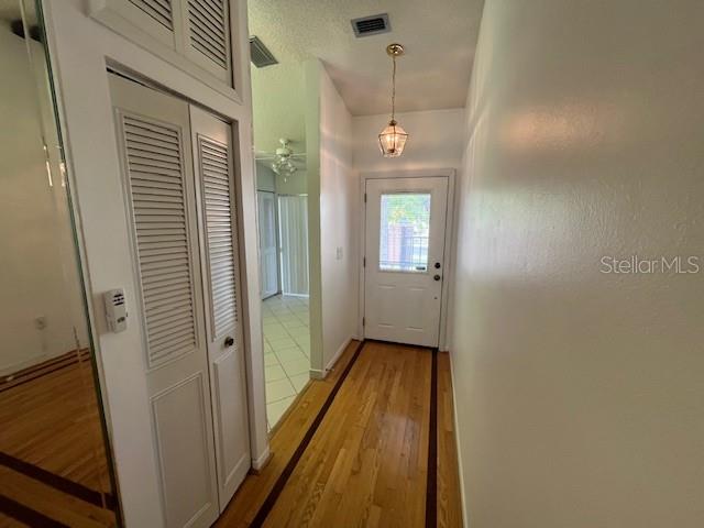 1725 Pine Ridge Way East, Unit C Palm Harbor, FL 34684 - Photo 5 of 28 a view of a hallway