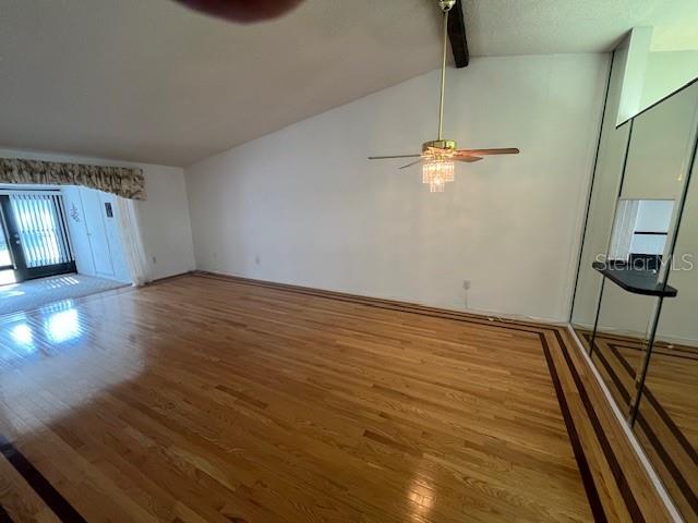 1725 Pine Ridge Way East, Unit C Palm Harbor, FL 34684 - Photo 10 of 28 a view of a room with wooden floor