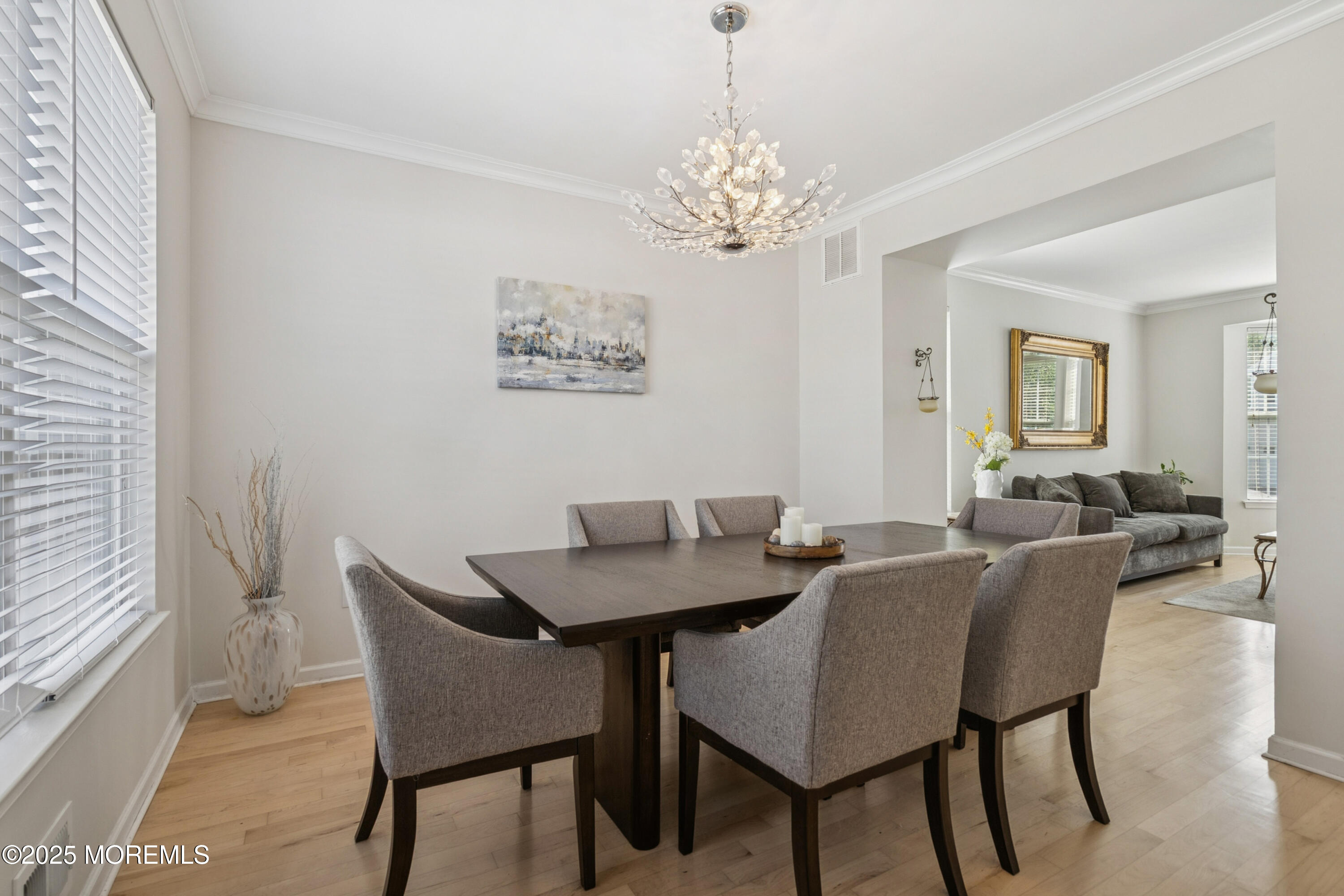 7 Devonshire Drive Hazlet, NJ 07730 - Photo 4 of 19 a view of a dining room with furniture and chandelier