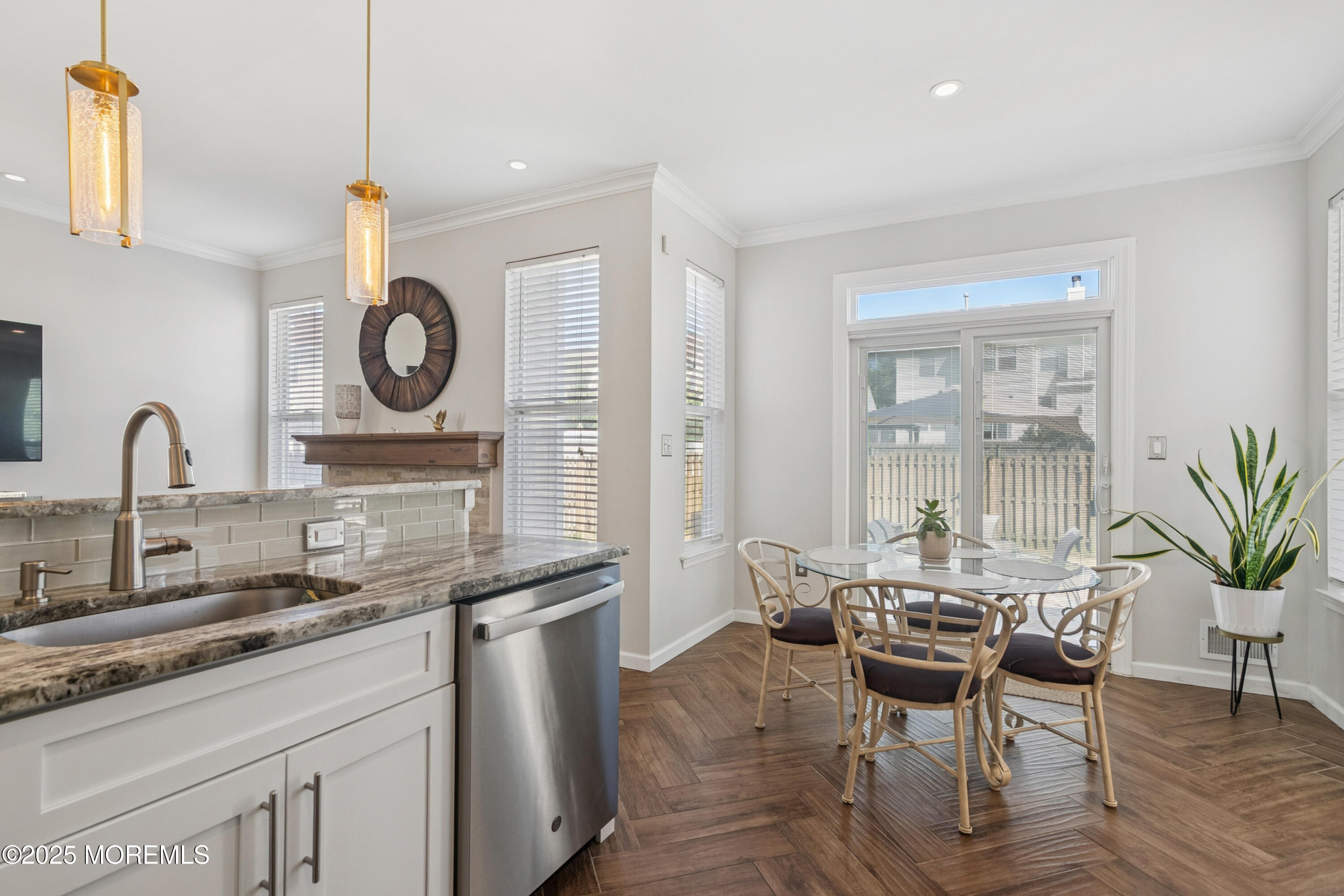 7 Devonshire Drive Hazlet, NJ 07730 - Photo 6 of 19 a kitchen with granite countertop a table and chairs