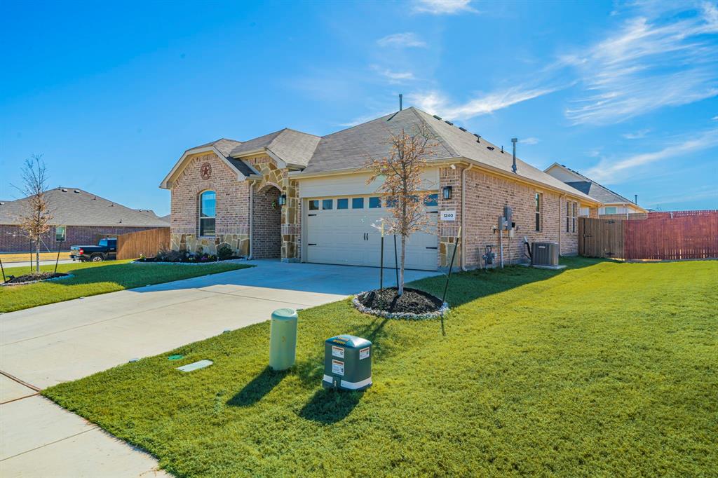 1240 Almond Road Azle, TX 76020 - Photo 19 of 26 a front view of house with yard