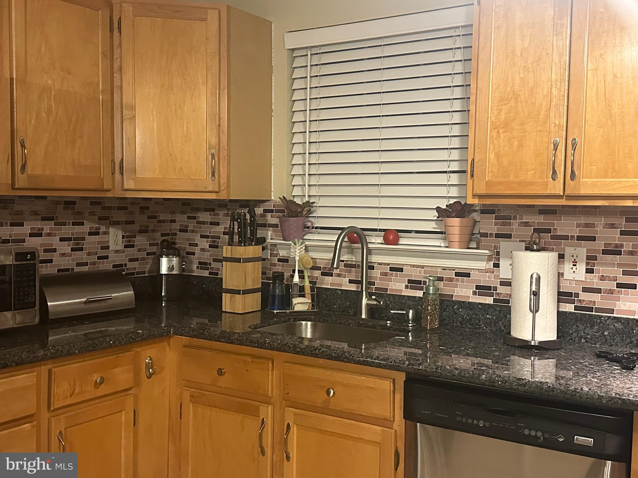 50 Haverford Road Runnemede, NJ 08078 - Photo 12 of 34 a kitchen with sink a window and cabinets