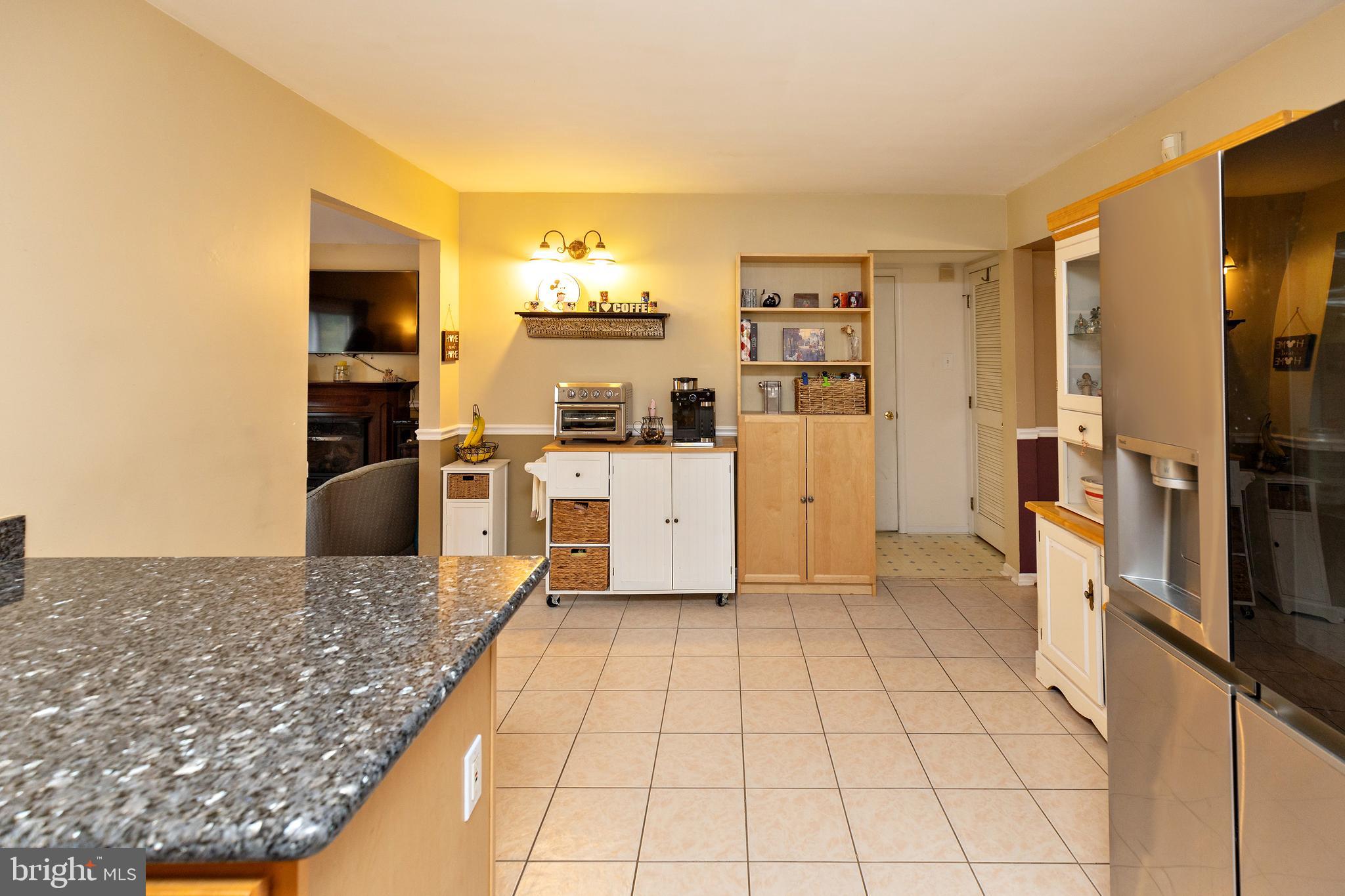 50 Haverford Road Runnemede, NJ 08078 - Photo 14 of 34 a kitchen with stainless steel appliances granite countertop a refrigerator and a stove top oven