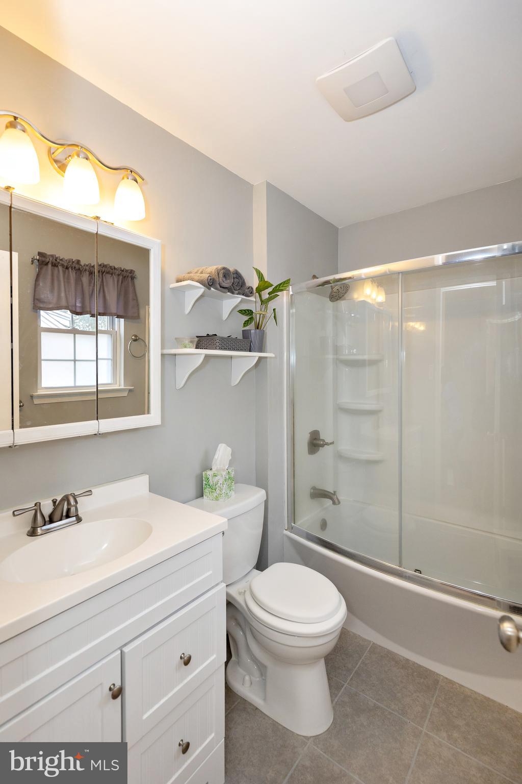 50 Haverford Road Runnemede, NJ 08078 - Photo 29 of 34 a bathroom with a sink a toilet and shower