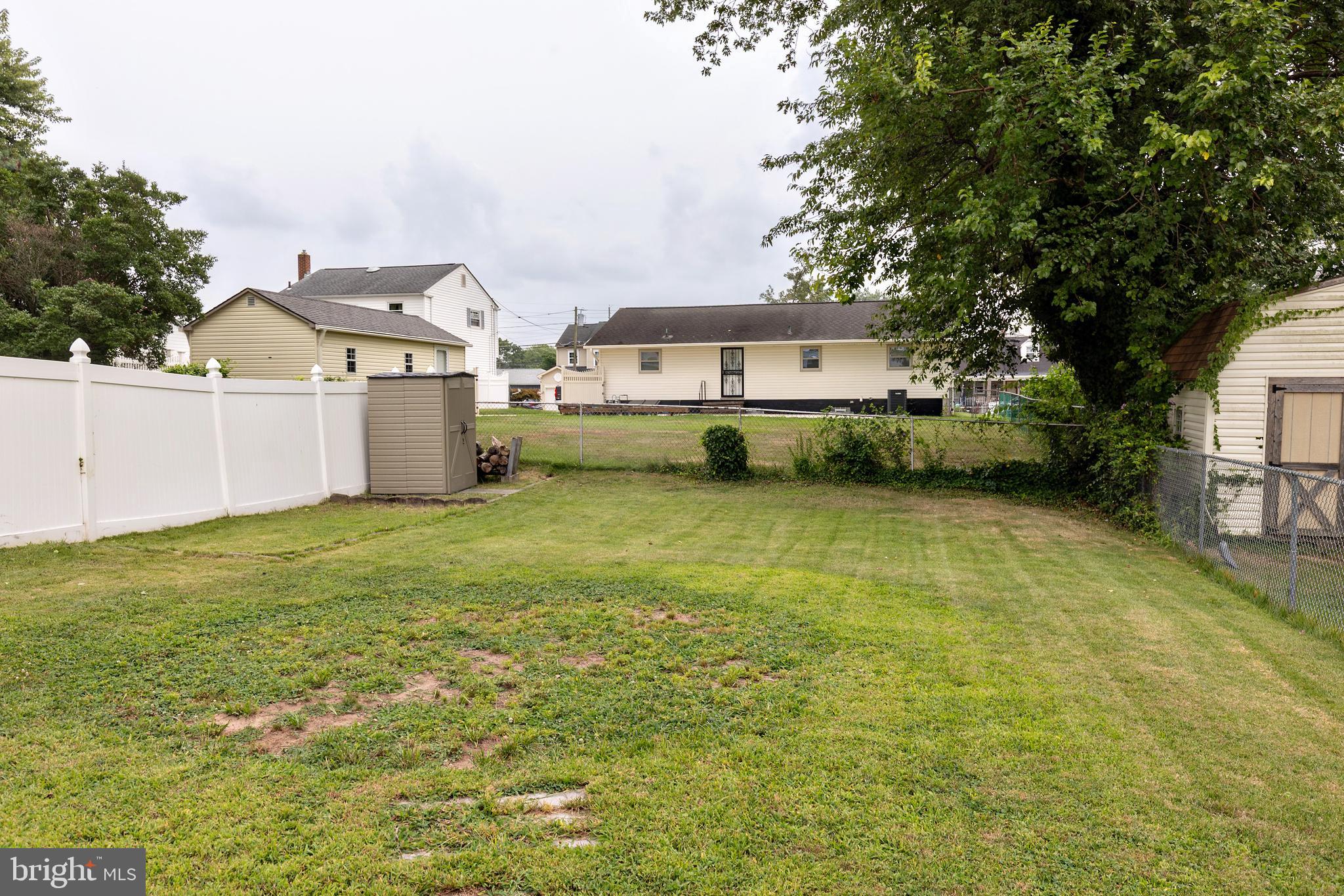 50 Haverford Road Runnemede, NJ 08078 - Photo 3 of 34 a front view of a house with a garden