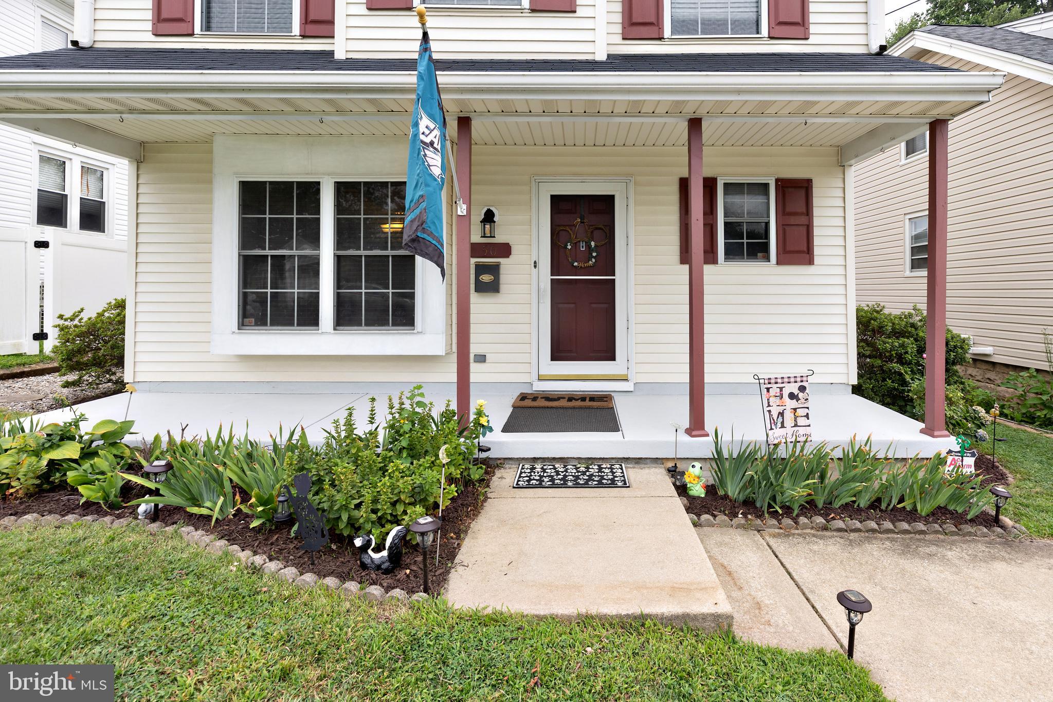 50 Haverford Road Runnemede, NJ 08078 - Photo 33 of 34 a front view of a house with a garden