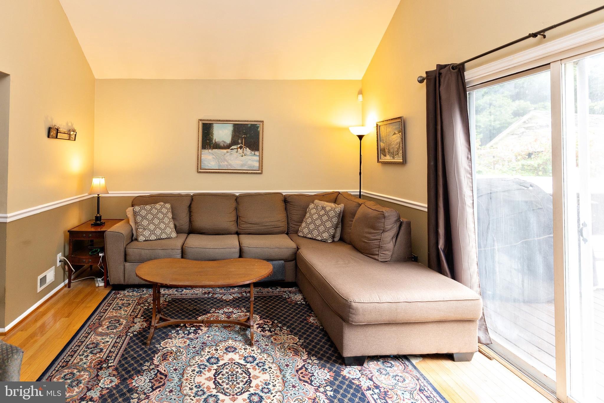 50 Haverford Road Runnemede, NJ 08078 - Photo 6 of 34 a living room with a couch and a table