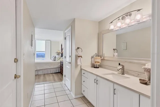 a spacious bathroom with a double vanity sink mirror and