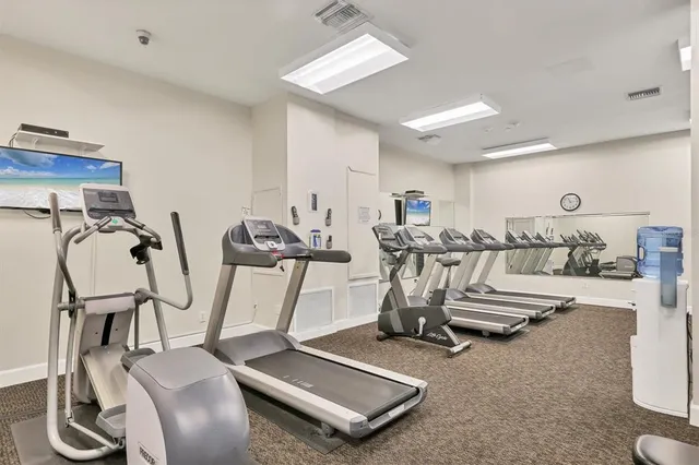 a view of a room with gym equipment