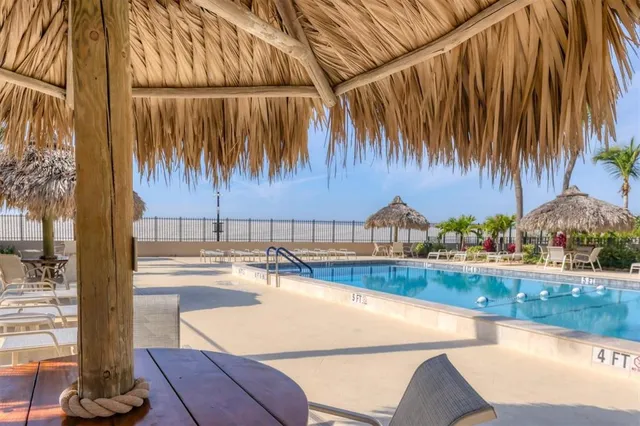 a kitchen with a table and chairs
