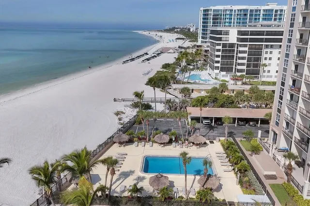 a view of swimming pool with outdoor seating