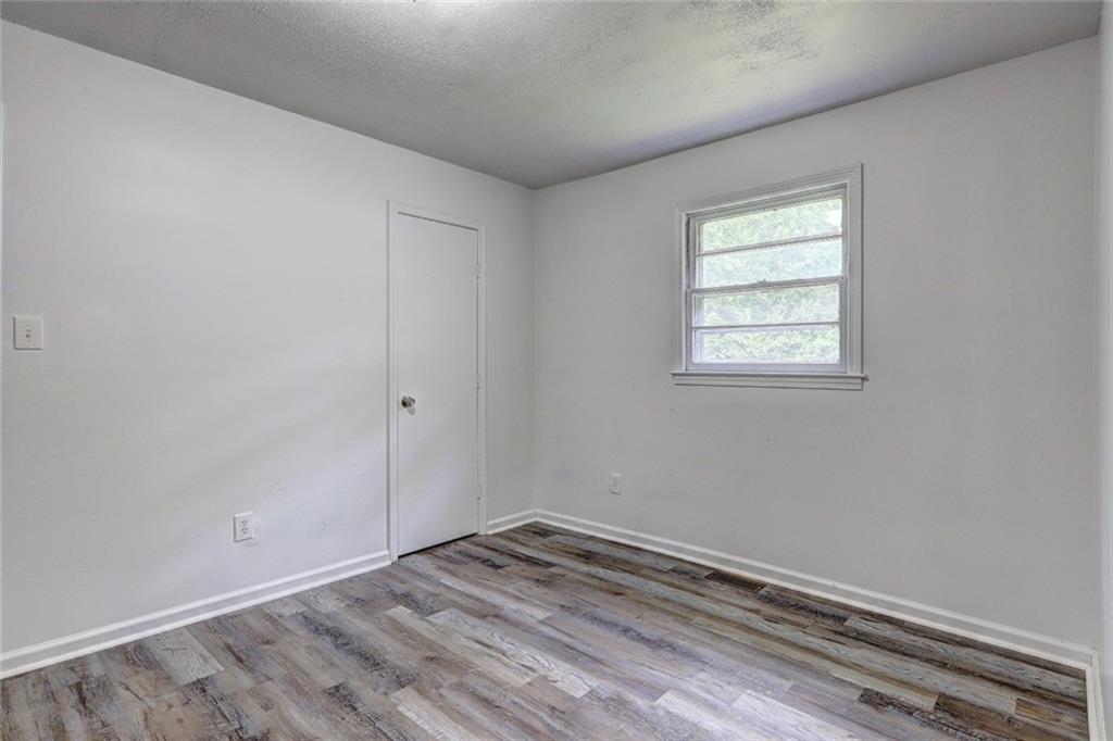 3266 Betty Place Macon, GA 31217 - Photo 7 of 10 an empty room with a window