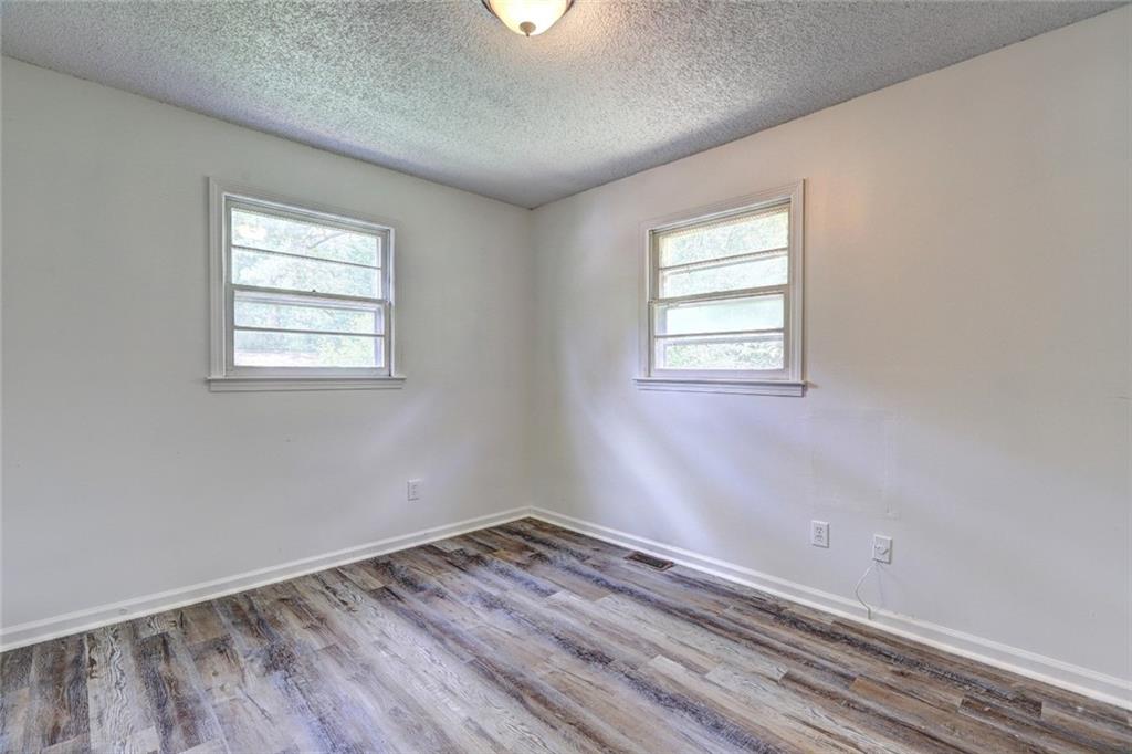 3266 Betty Place Macon, GA 31217 - Photo 9 of 10 an empty room with a window