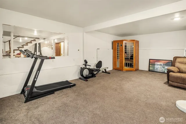 a view of a room with gym equipment